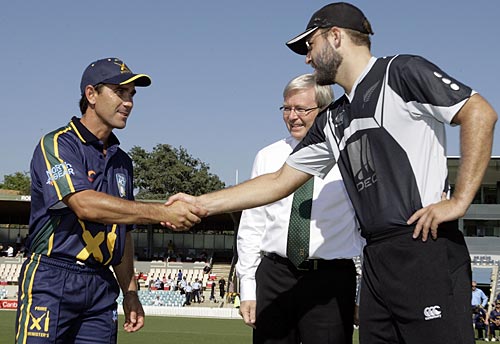 Pressure: Let's shake on it, say Justin Langer (left) and Daniel Vettori